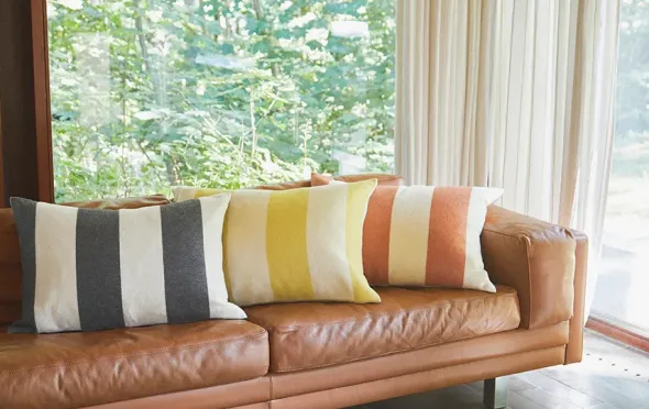 The Sweater Cushion, golden yellow fra Silkeborg Uldspinderi